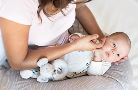 How to Use a Boppy Pillow 9 Best Ways (Breastfeeding, Nursing, Sitting etc.)