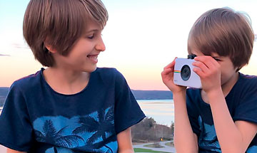 kids using polaroid camera