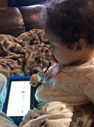 kid with prograce tablet